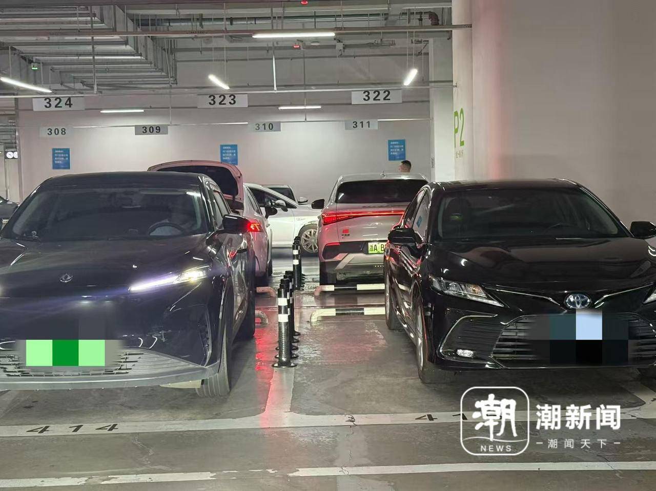 防了“开门杀”<strong></p>
<p>比特币换虚拟货币</strong>，却难了开车门？杭州西站网约车停车场软性护栏陷两难